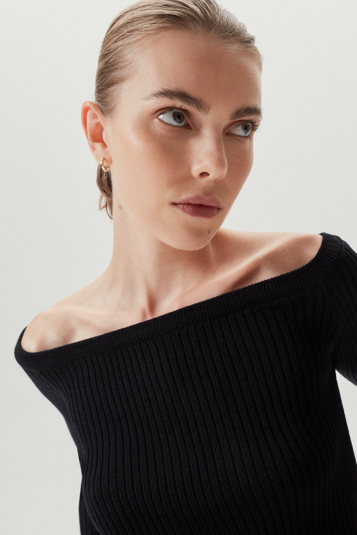 the merino wool off the shoulder top black
