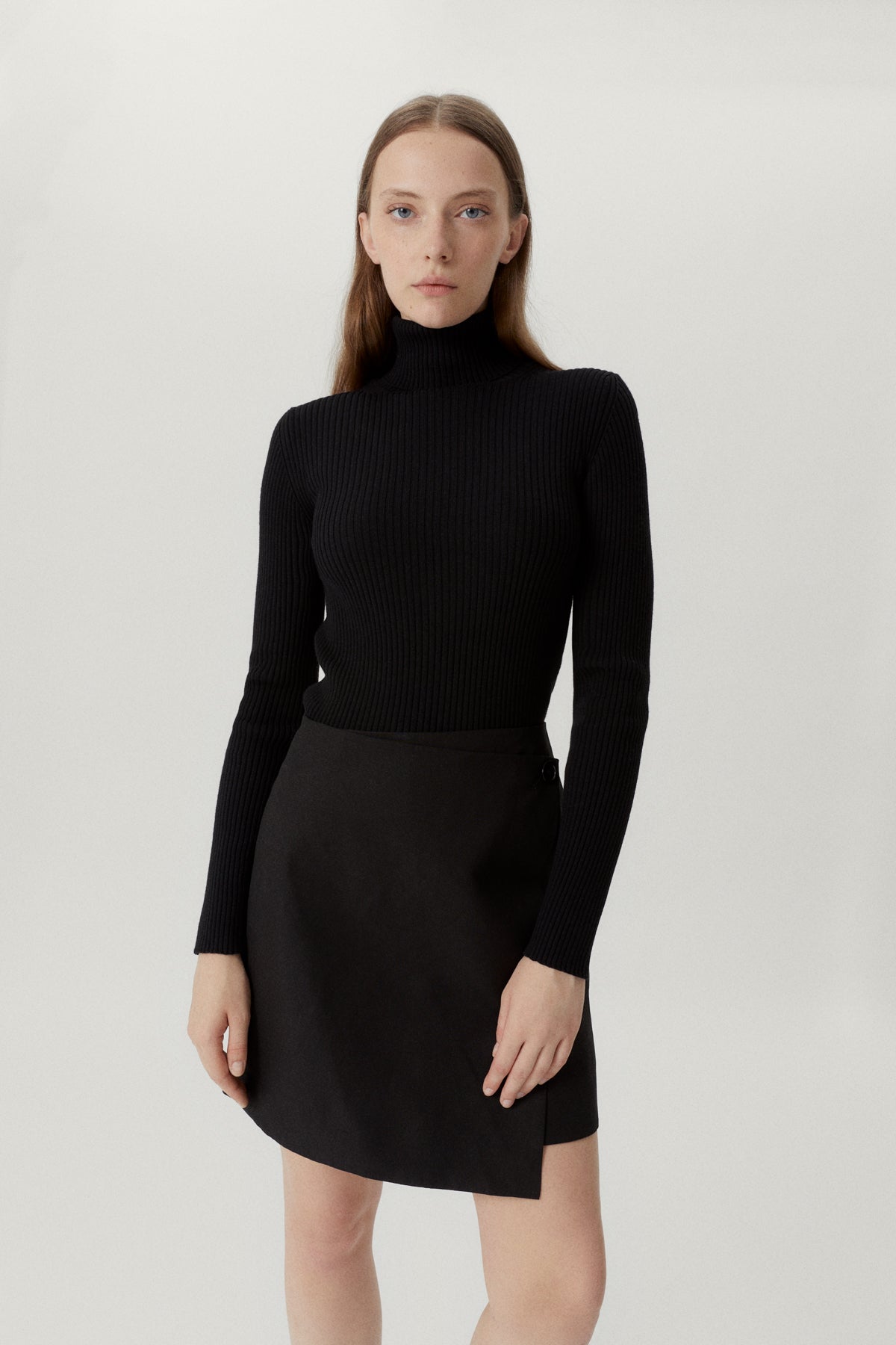 the merino wool ribbed roll neck black