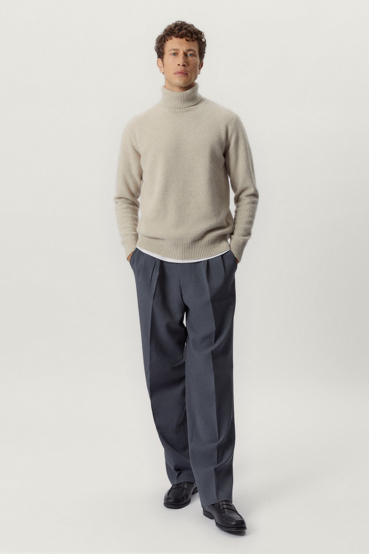 the woolen roll neck ecru